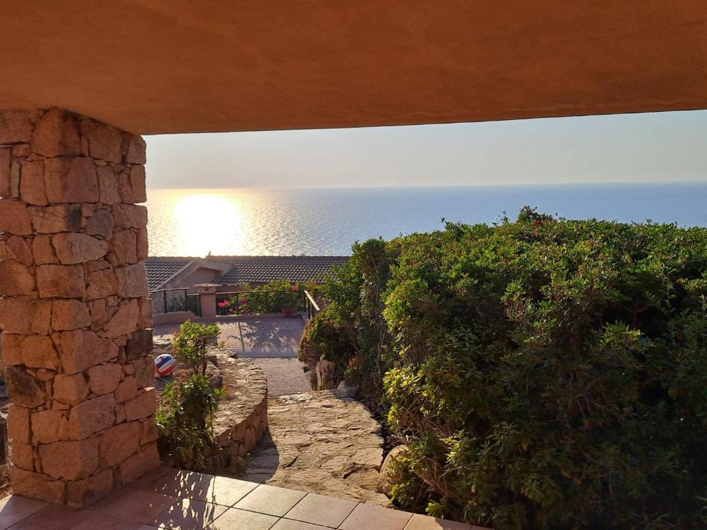 a view of the ocean from a house at villetta costa paradiso in Costa Paradiso