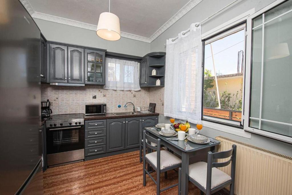 Kuchyň nebo kuchyňský kout v ubytování Dimi House
