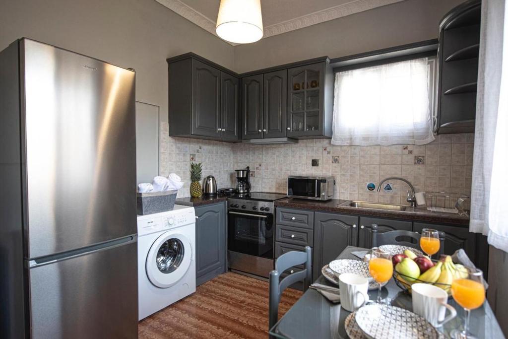 Kuchyň nebo kuchyňský kout v ubytování Dimi House