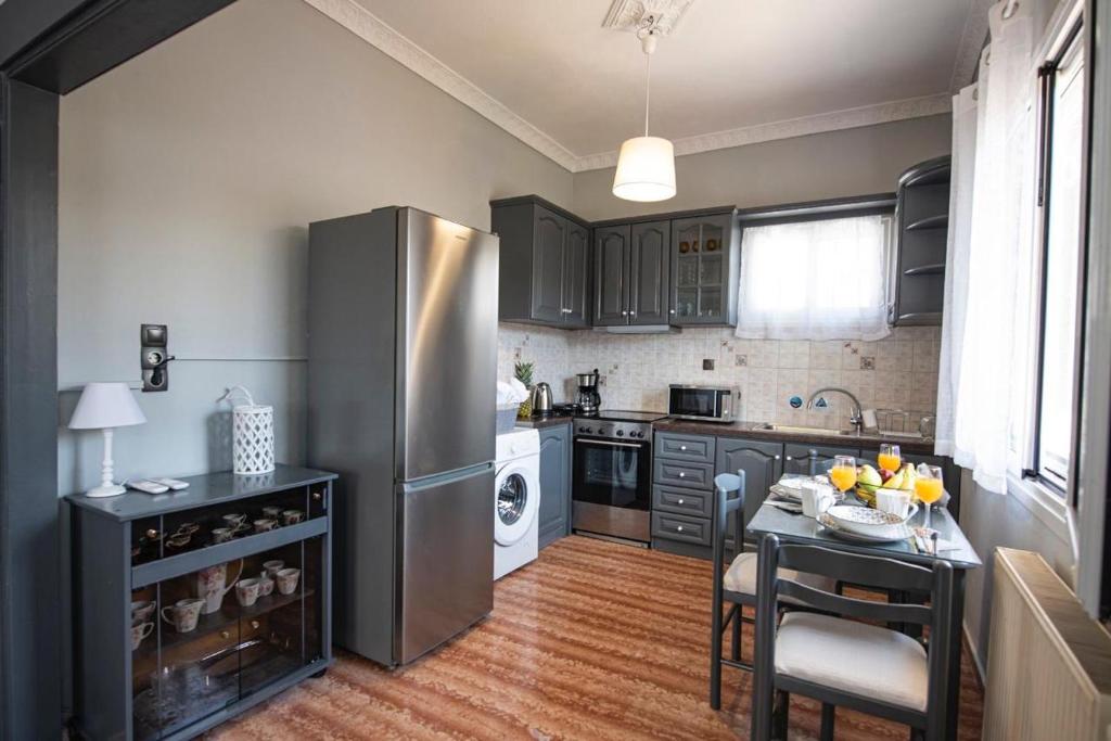Kuchyň nebo kuchyňský kout v ubytování Dimi House