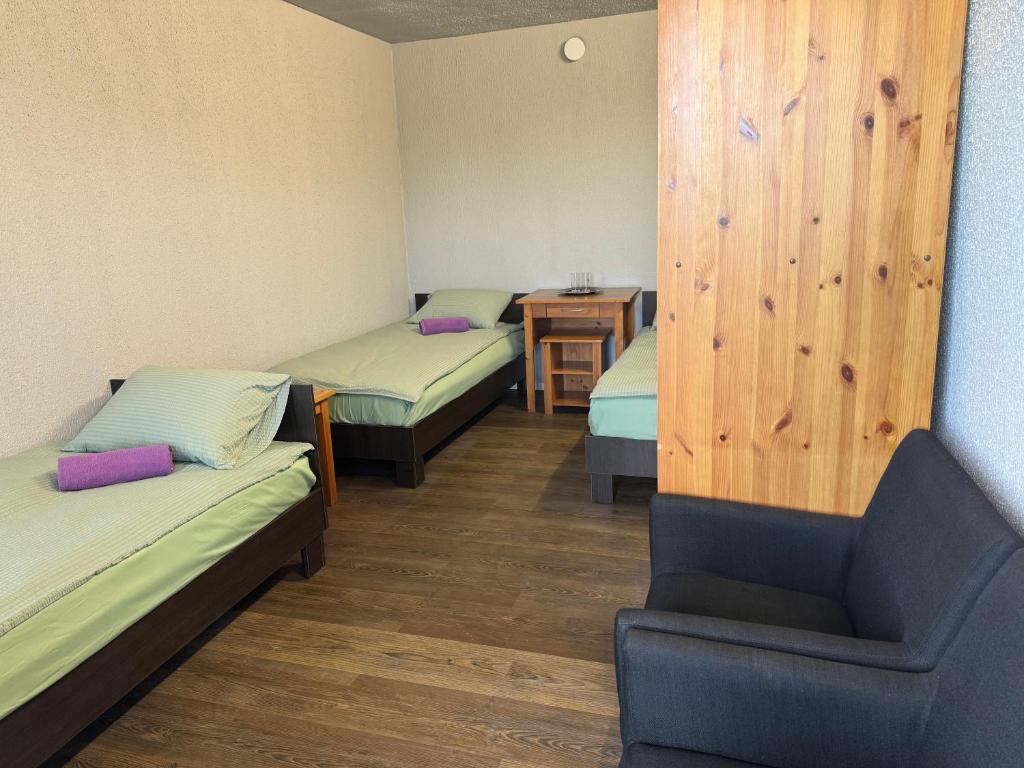 Postel nebo postele na pokoji v ubytování Mūsa Kemping