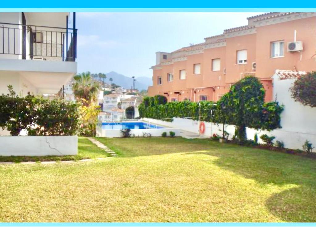 The swimming pool at or close to APARTAMENTO AGUAMARINA Nsf54 -NERJA