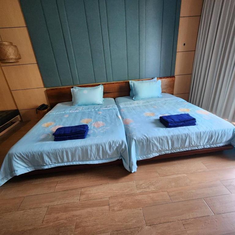 Postel nebo postele na pokoji v ubytování CHILCHILL Hotel Riverside