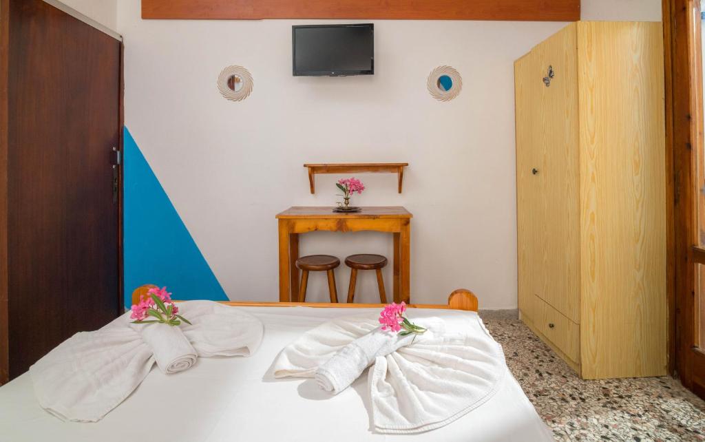 Postel nebo postele na pokoji v ubytování Minoa sea rooms