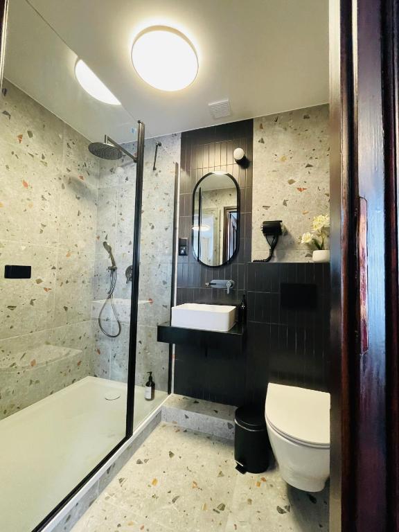 Kúpeľňa v ubytovaní Hotel Millennium