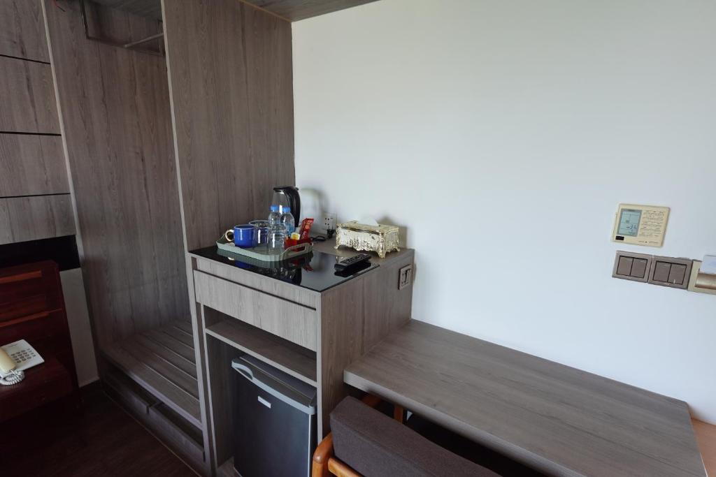 Kuchyň nebo kuchyňský kout v ubytování CHILCHILL Hotel Riverside