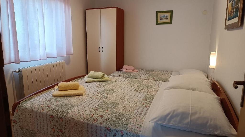 Postel nebo postele na pokoji v ubytování Apartment Zdenka-5 km from Opatija