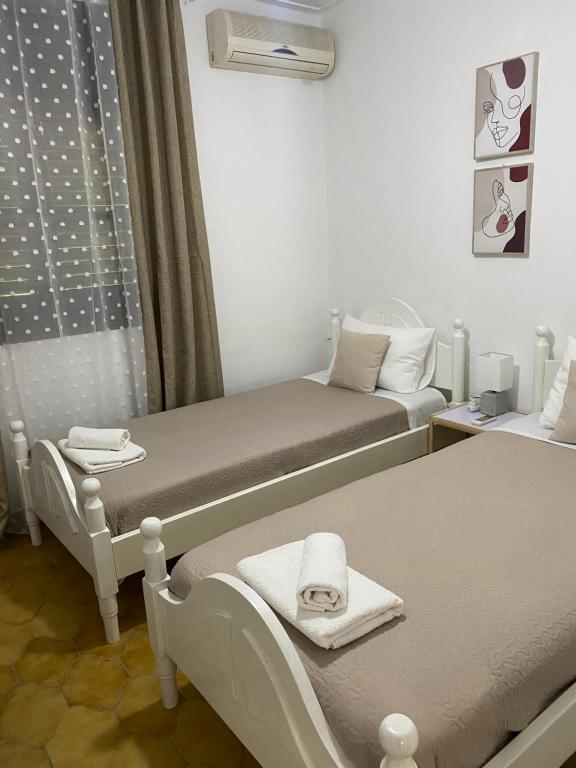 Postel nebo postele na pokoji v ubytování Zante Star Summer House