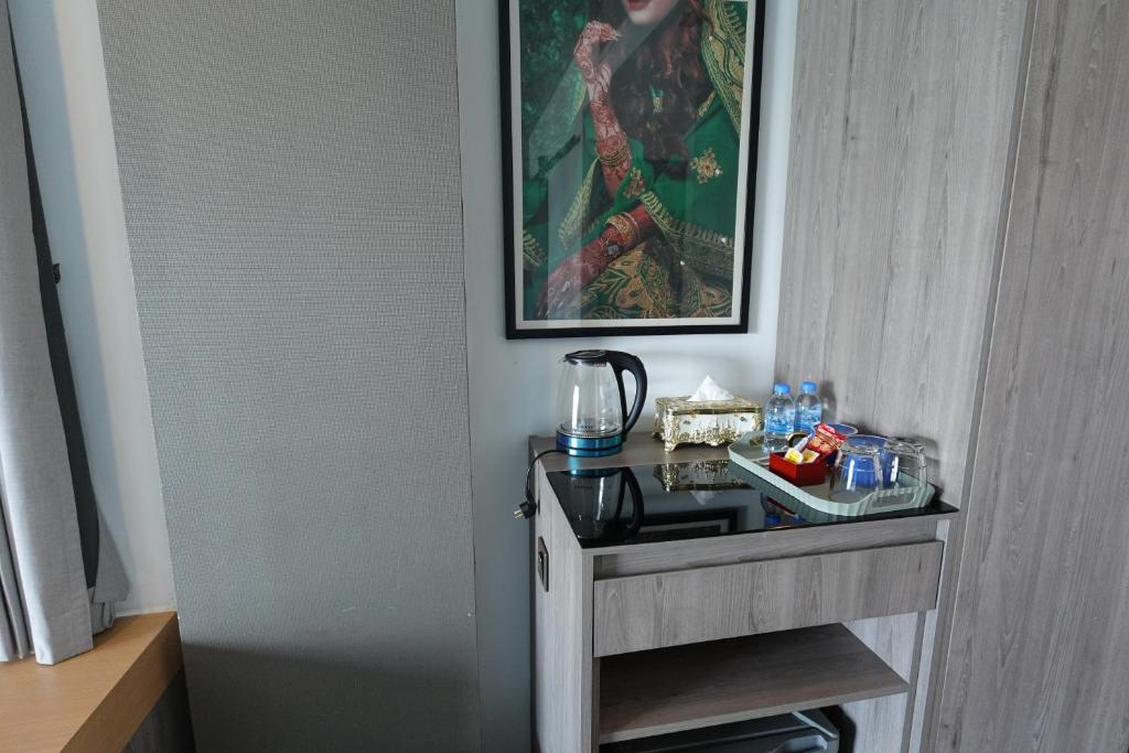 Příslušenství pro přípravu čaje a kávy v ubytování CHILCHILL Hotel Riverside