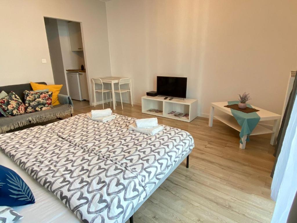 Televízia a/alebo spoločenská miestnosť v ubytovaní Marcina Kasprzaka 29c