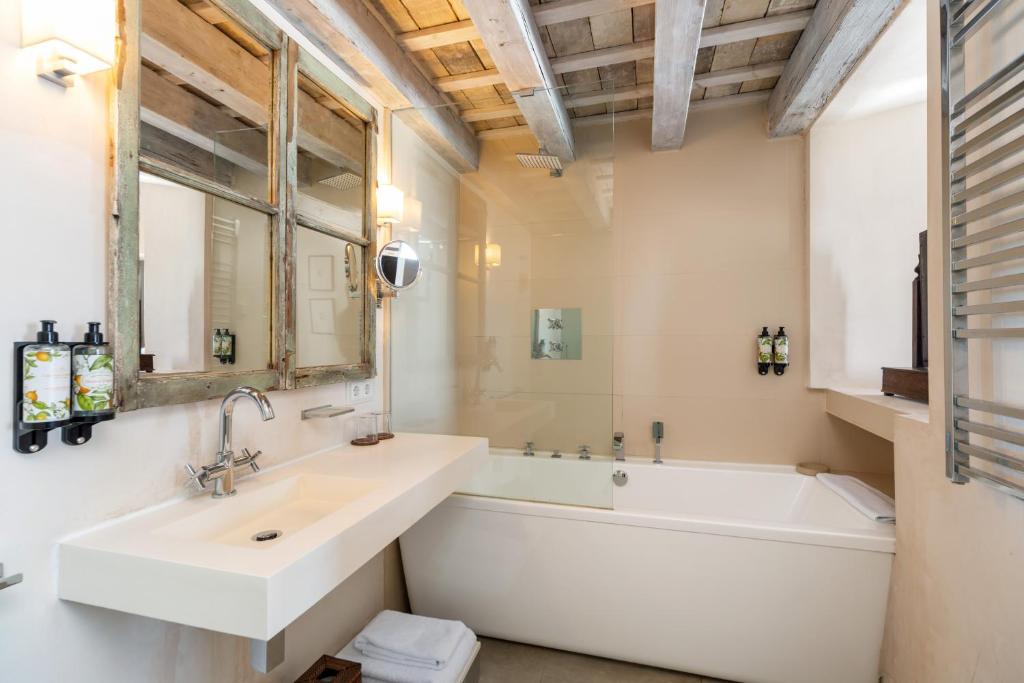 Een badkamer bij Hotel Boutique V