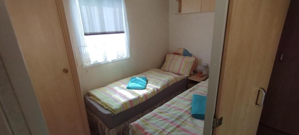 Postel nebo postele na pokoji v ubytování Apartmány Věra
