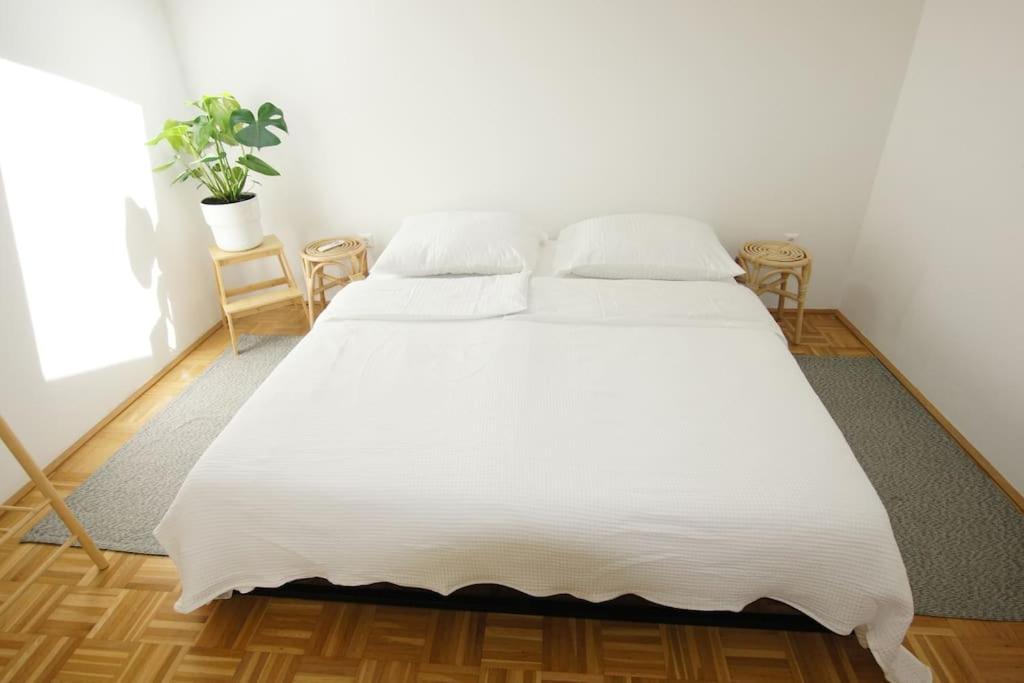 Postel nebo postele na pokoji v ubytování Quartier 27 - Apartment 60m2