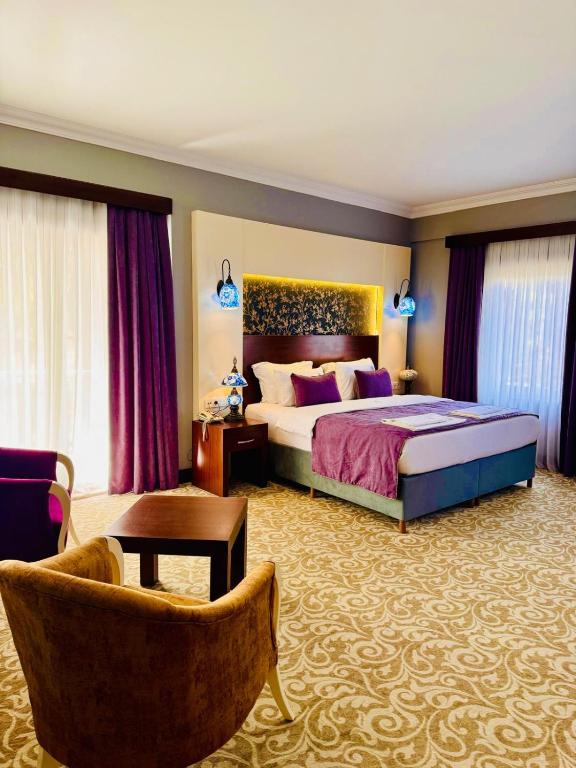 Postel nebo postele na pokoji v ubytování Pamukkale Whiteheaven Suite Hotel