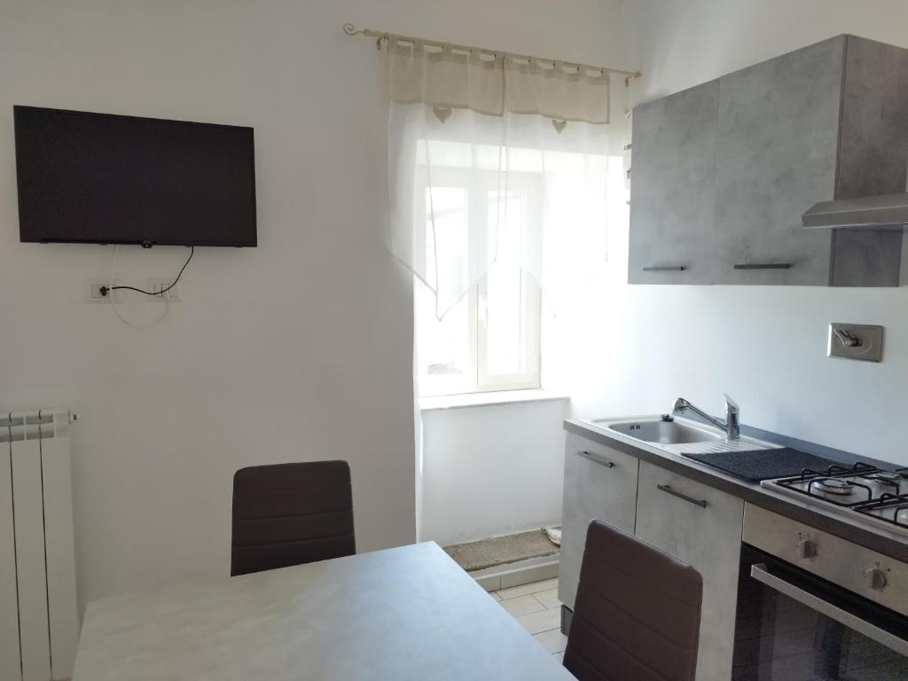 Kuchyň nebo kuchyňský kout v ubytování CASA BORGIA