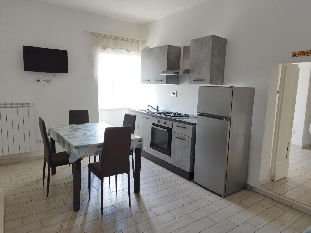 Kuchyň nebo kuchyňský kout v ubytování CASA BORGIA