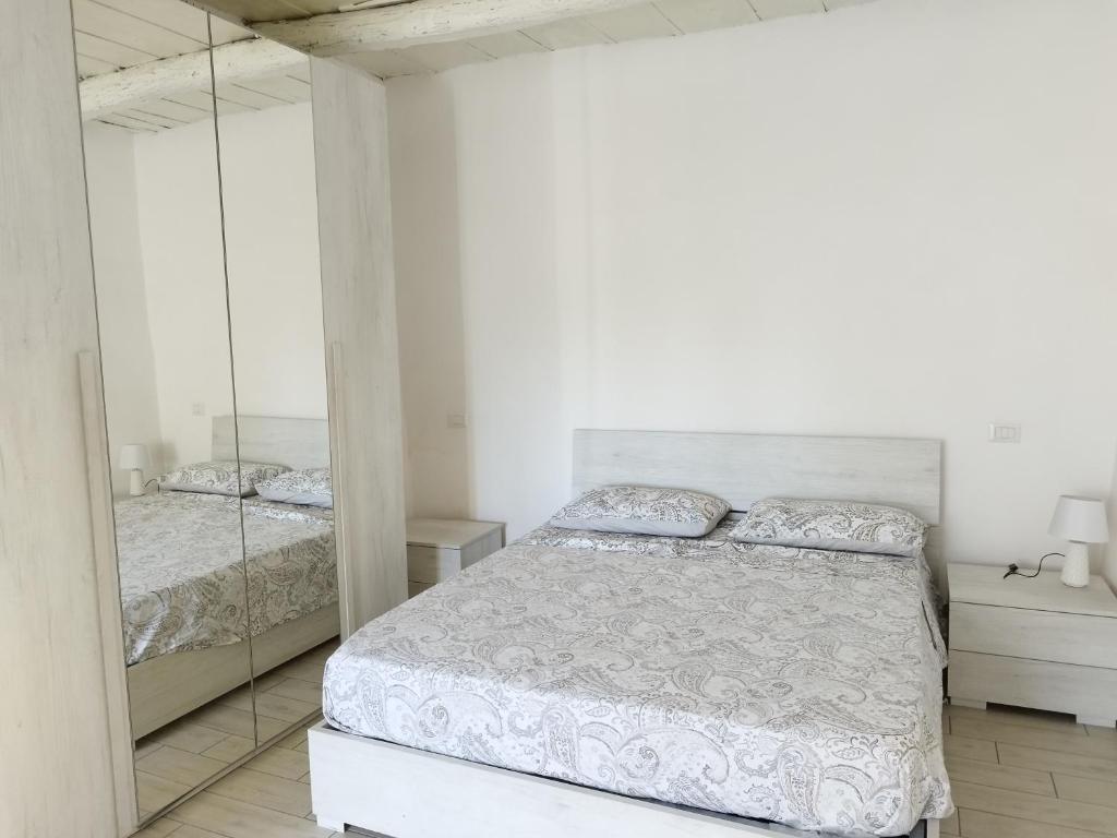 Postel nebo postele na pokoji v ubytování CASA BORGIA