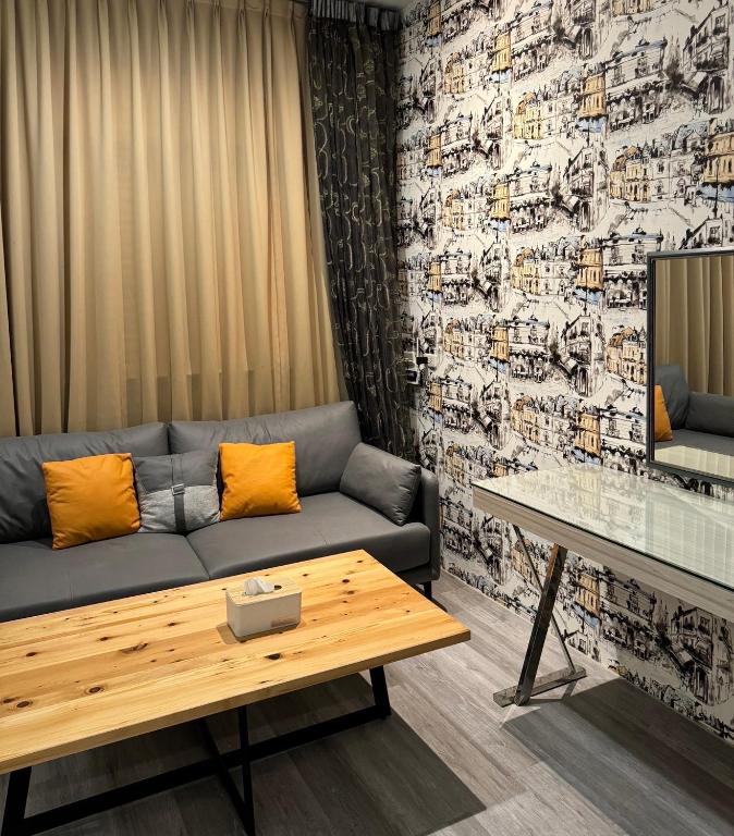 Posezení v ubytování Her Home Spa Motel Douliu