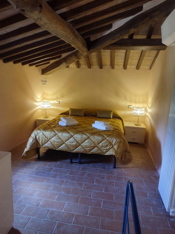 Posteľ alebo postele v izbe v ubytovaní Cordella in Montalcino Wine Resort
