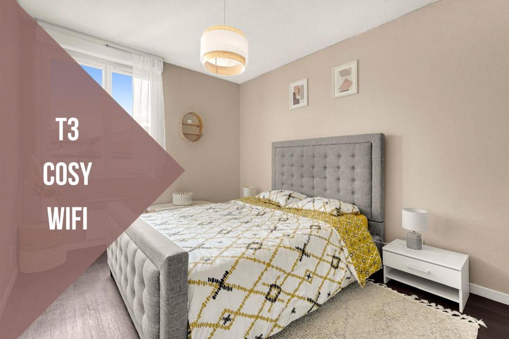 Ένα ή περισσότερα κρεβάτια σε δωμάτιο στο Le Chapitre Toulousain