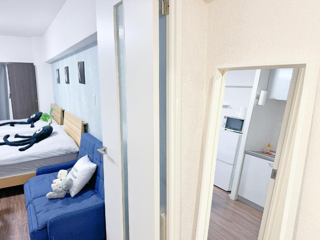Postel nebo postele na pokoji v ubytování 山手線池袋駅7分6人可