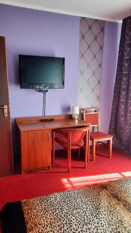 TV a/nebo společenská místnost v ubytování Willa Stok ***