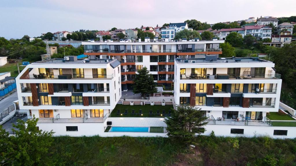 an aerial view of two buildings in a city at Saint George apartments in Varna City