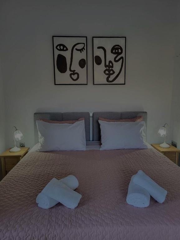 Postel nebo postele na pokoji v ubytování Casa Nostra Maisonette