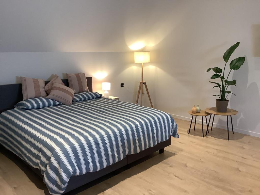 Postel nebo postele na pokoji v ubytování Mangée