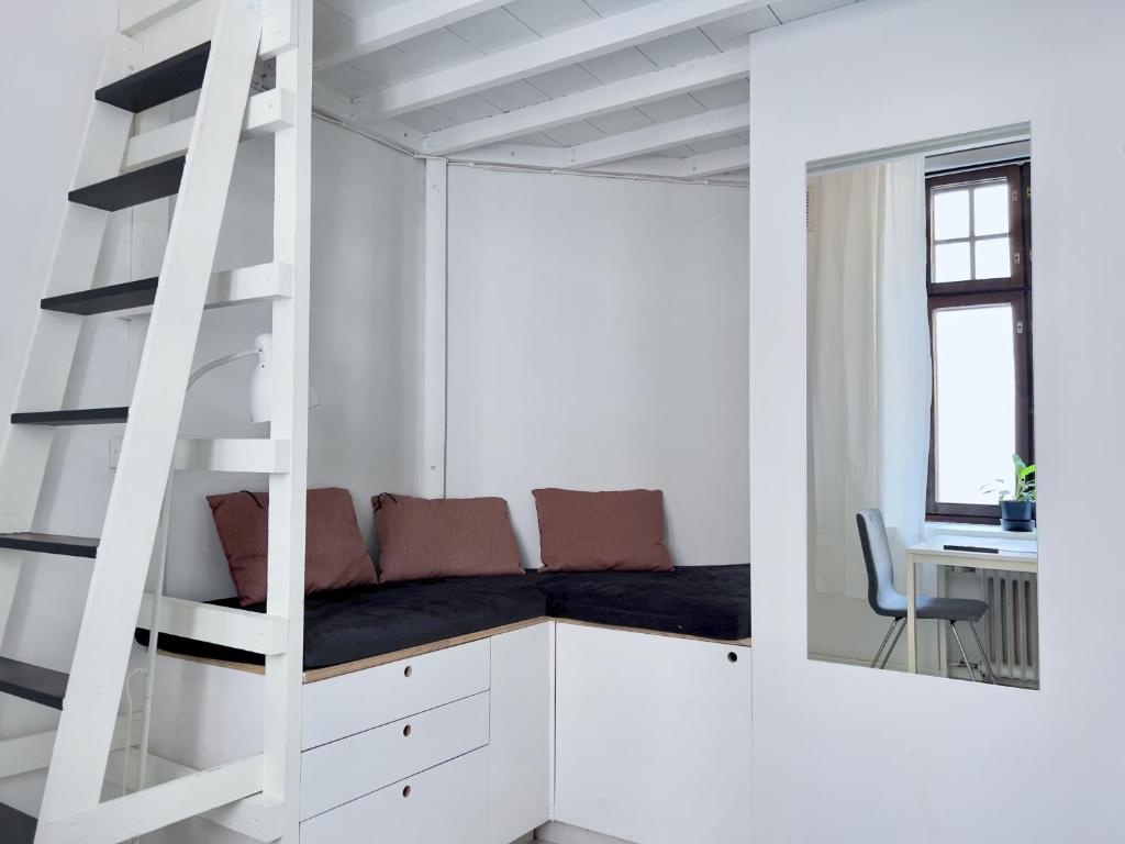 Ruang duduk di Dainty Central Apartment Helsinki