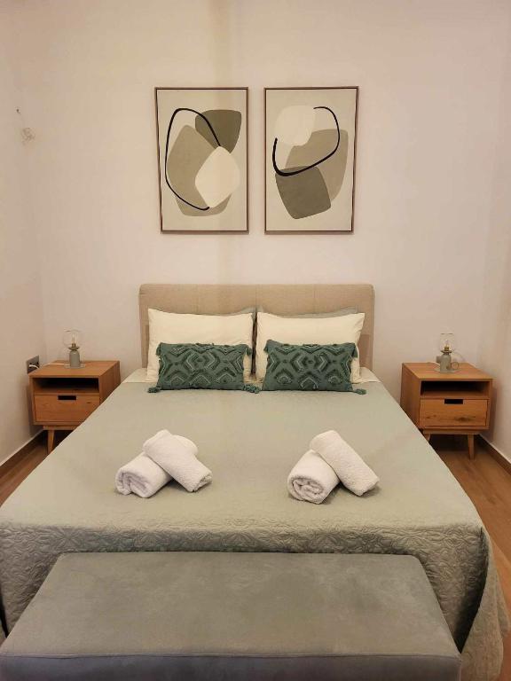 Postel nebo postele na pokoji v ubytování Casa Nostra Maisonette