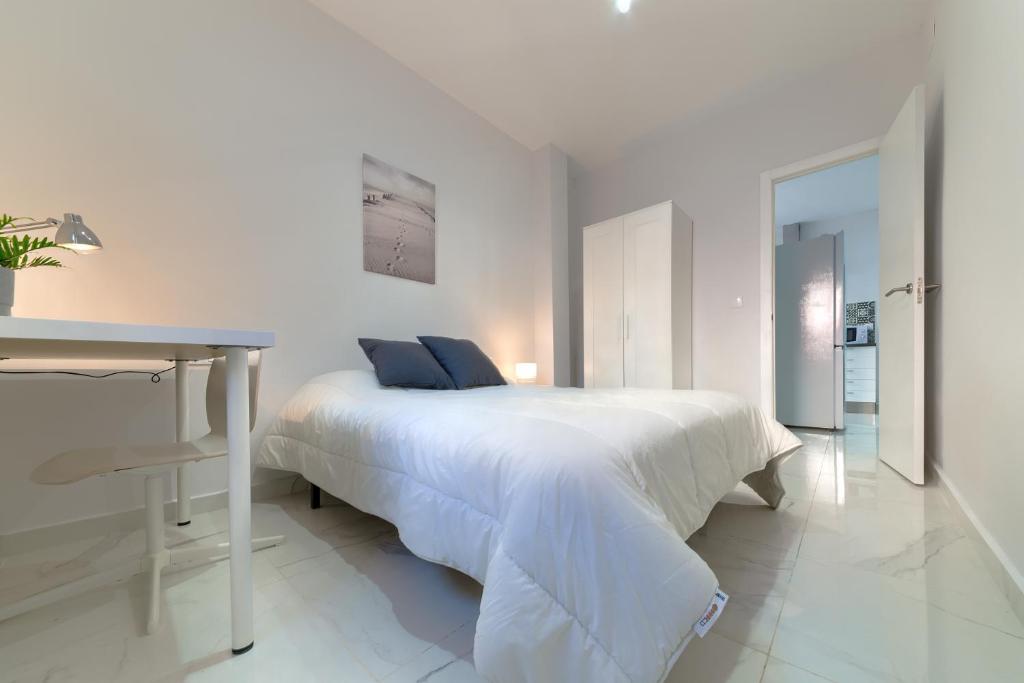 Posteľ alebo postele v izbe v ubytovaní Apartamento San Félix, Playa La Caleta