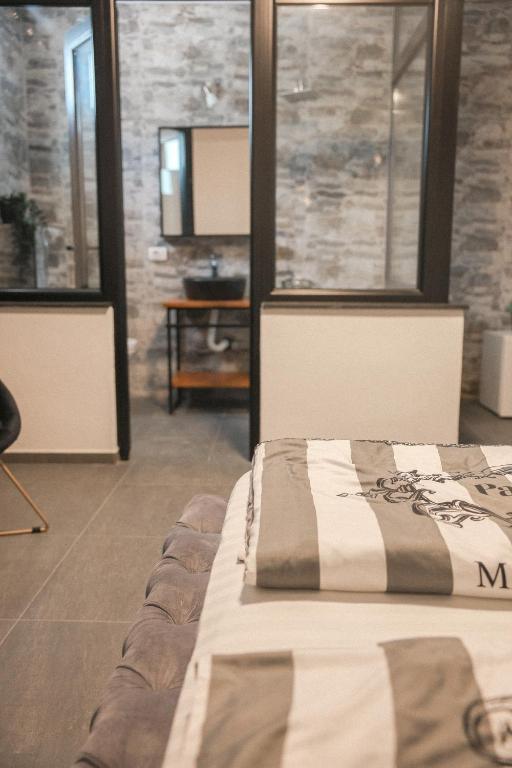 Postel nebo postele na pokoji v ubytování Casa Selimi