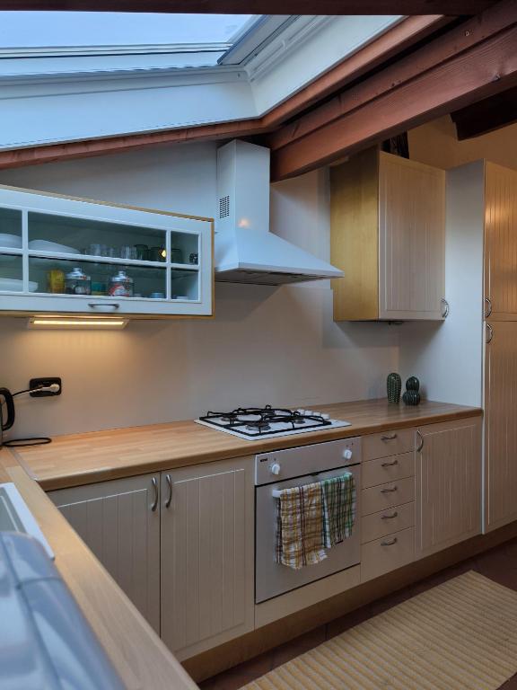 Kuchyň nebo kuchyňský kout v ubytování SG Family - Oblò apartment