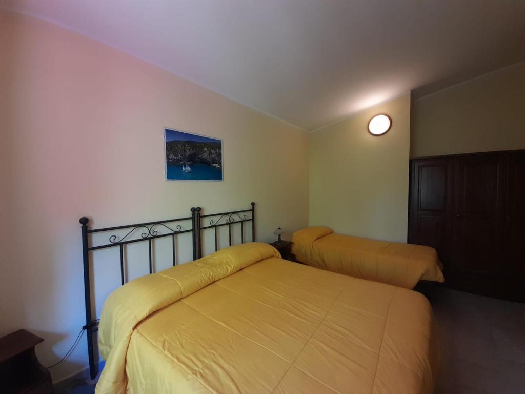 Postel nebo postele na pokoji v ubytování Hotel Sant'elene