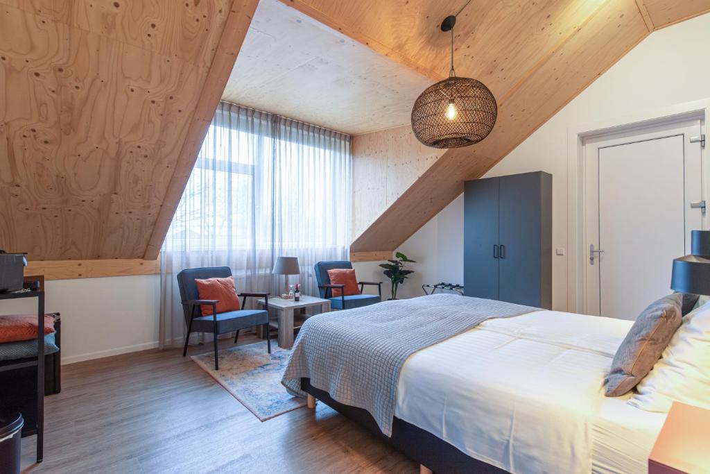 Postel nebo postele na pokoji v ubytování Villa Zoutelande