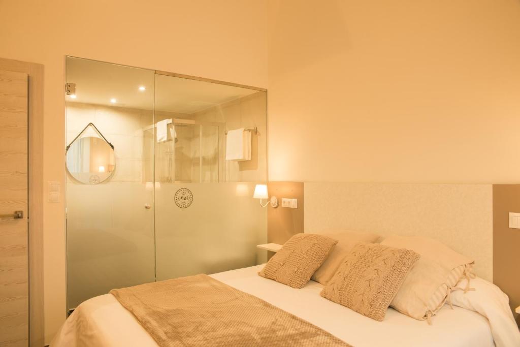 Postel nebo postele na pokoji v ubytování Apartamentos Estela de Altamira