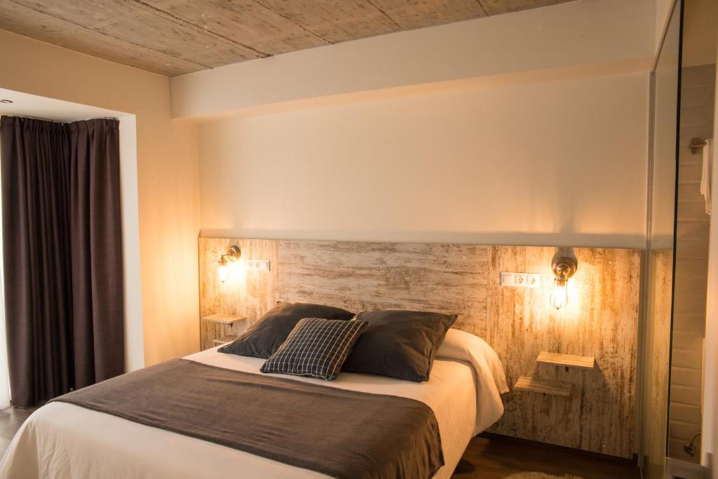 Postel nebo postele na pokoji v ubytování Apartamentos Estela de Altamira