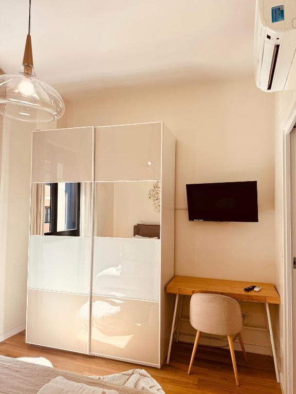 Televízia a/alebo spoločenská miestnosť v ubytovaní Futura Exclusive Suite 2