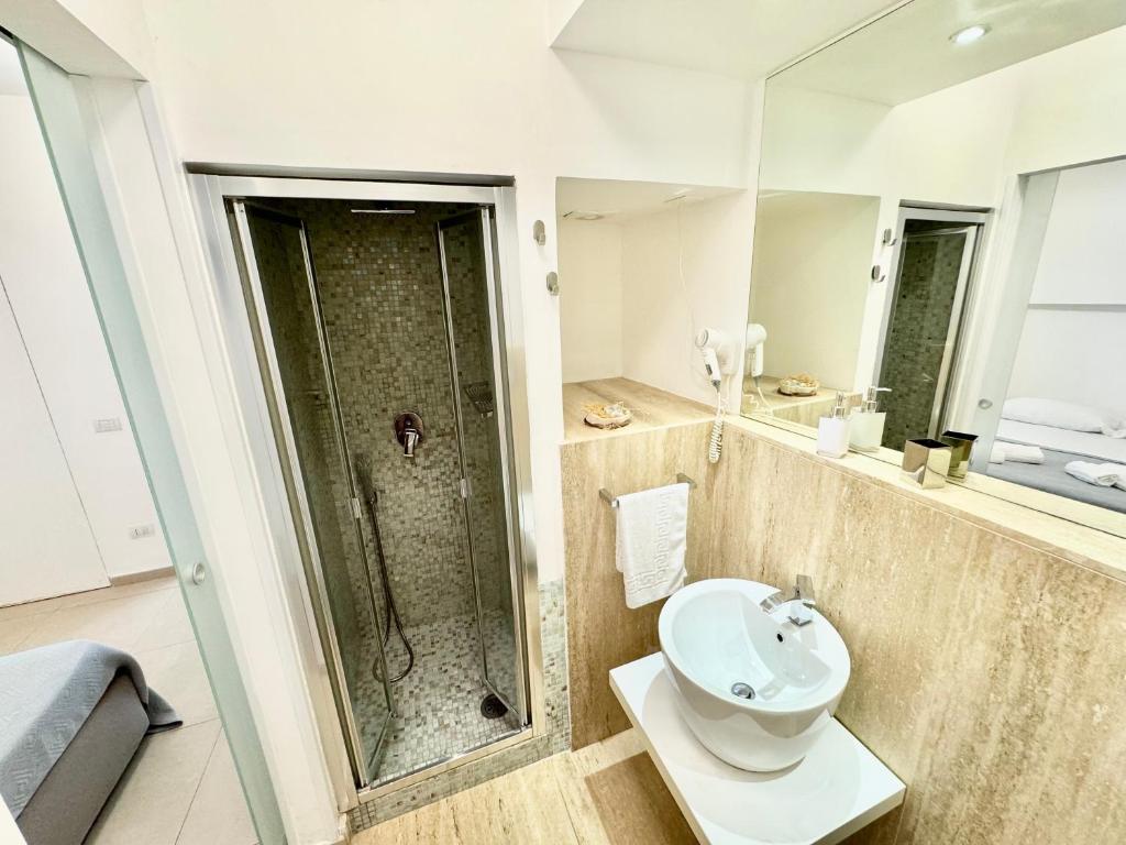 a bathroom with a shower and a sink at La Gaetana in Gaeta