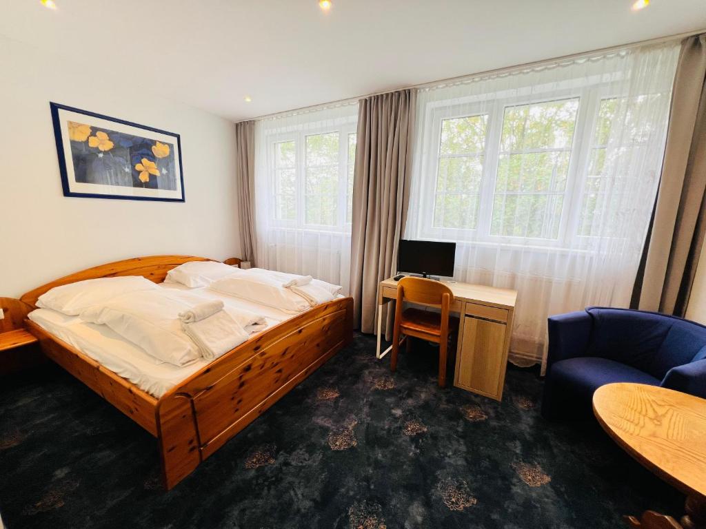 En eller flere senge i et værelse på City Apartment Hotel Hamburg
