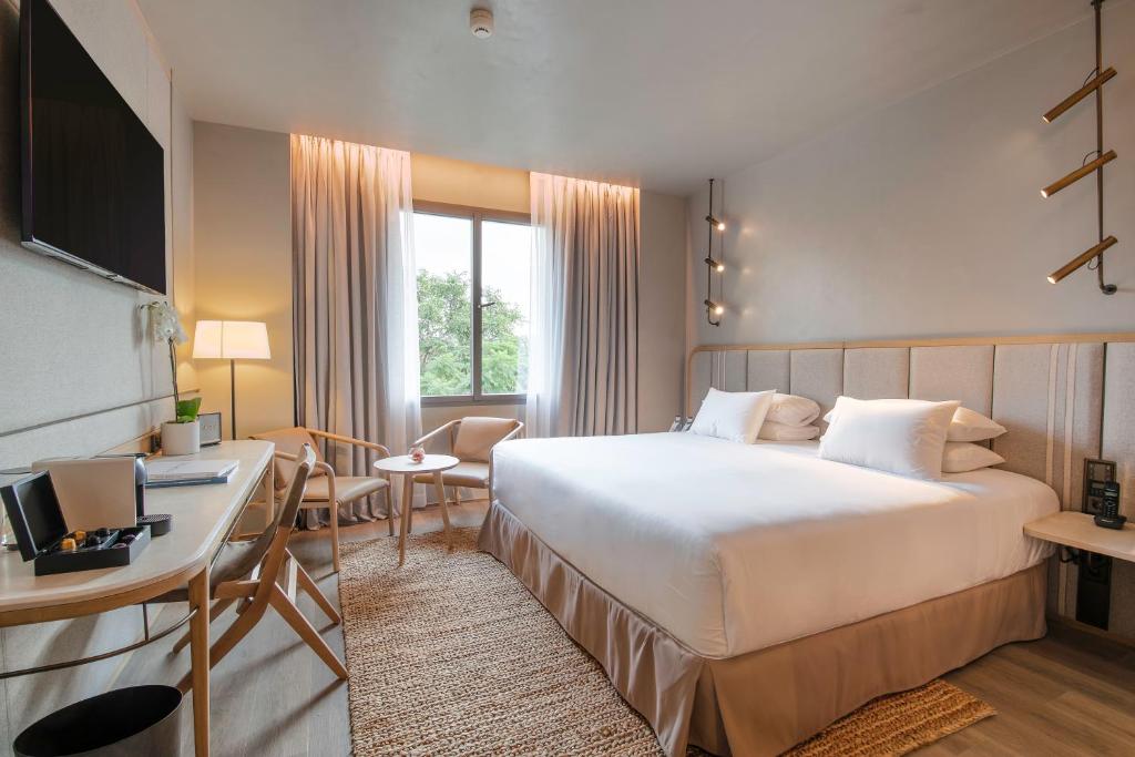 Postel nebo postele na pokoji v ubytování Only YOU Hotel Málaga