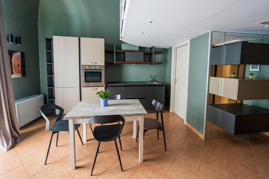 Kuchyň nebo kuchyňský kout v ubytování ArcoLoBello B&B ApartHotel