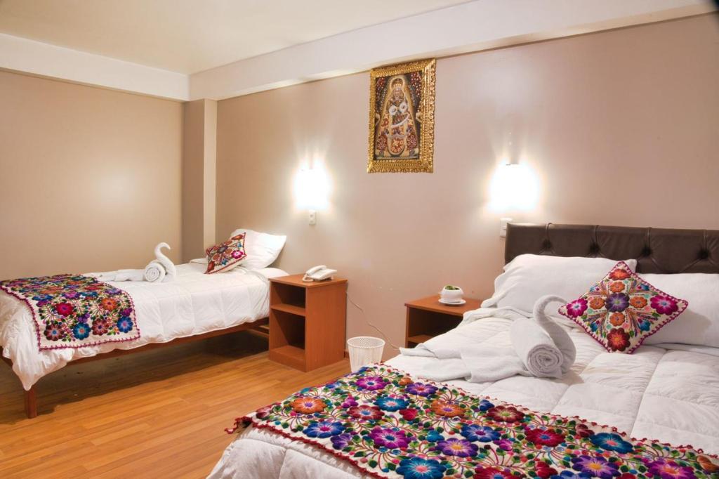 Katil atau katil-katil dalam bilik di Hotel Joram