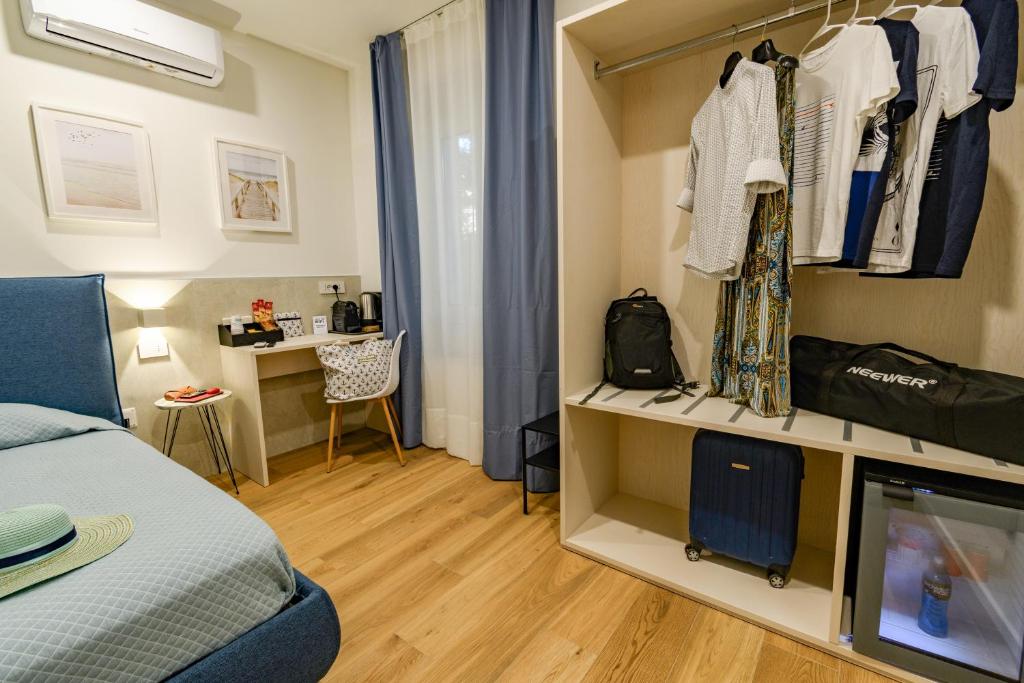 TV a/nebo společenská místnost v ubytování Harbor Rooms - Cala Gonone