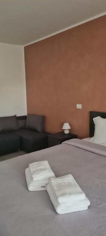 Postel nebo postele na pokoji v ubytování Pensiunea Danubio