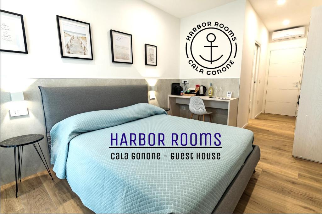 Postel nebo postele na pokoji v ubytování Harbor Rooms - Cala Gonone