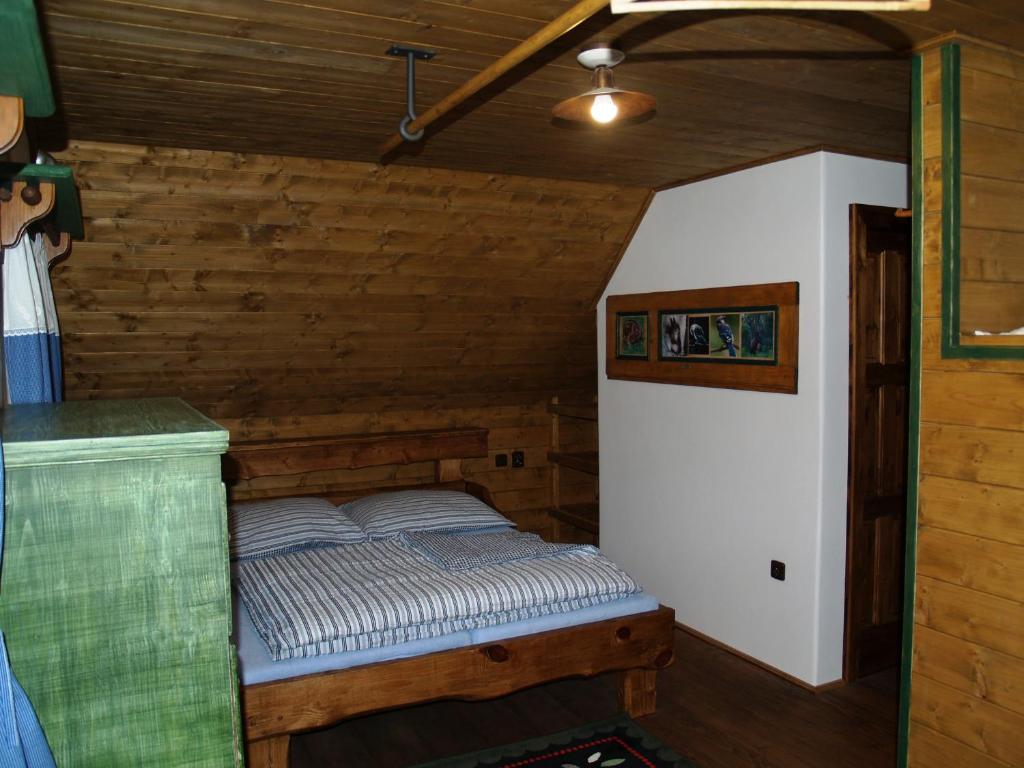 Postel nebo postele na pokoji v ubytování Chalupa Modré Nebe