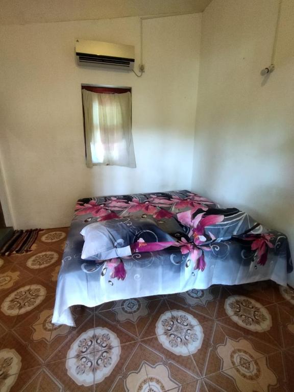 Postel nebo postele na pokoji v ubytování Lahiru Place
