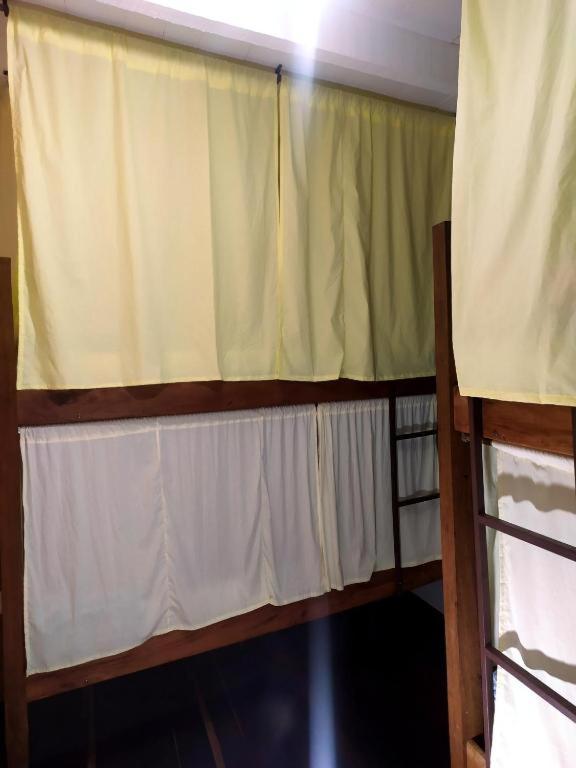 Postel nebo postele na pokoji v ubytování É Hostel